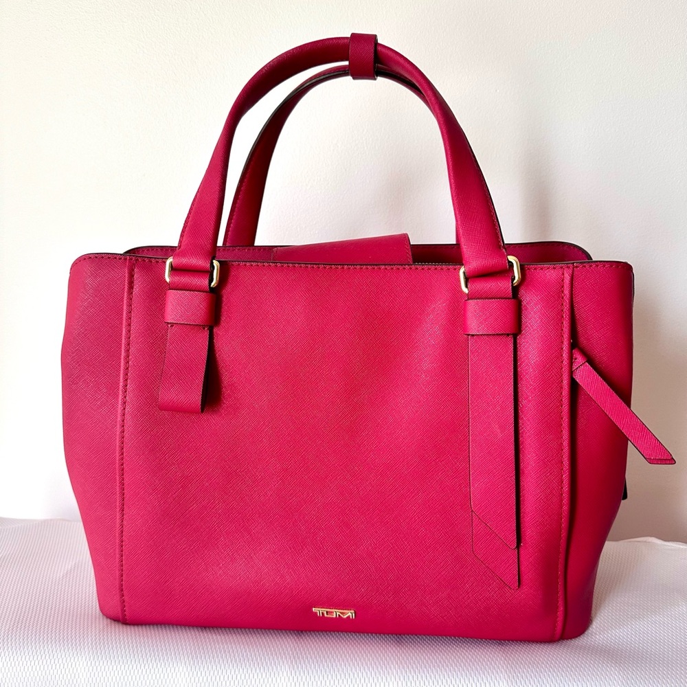 Tumi Berry colored leather satchel.